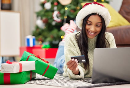 christmas-e-commerce-and-woman-with-laptop-credi-2023-07-12-23-54-43-utc (Medium)